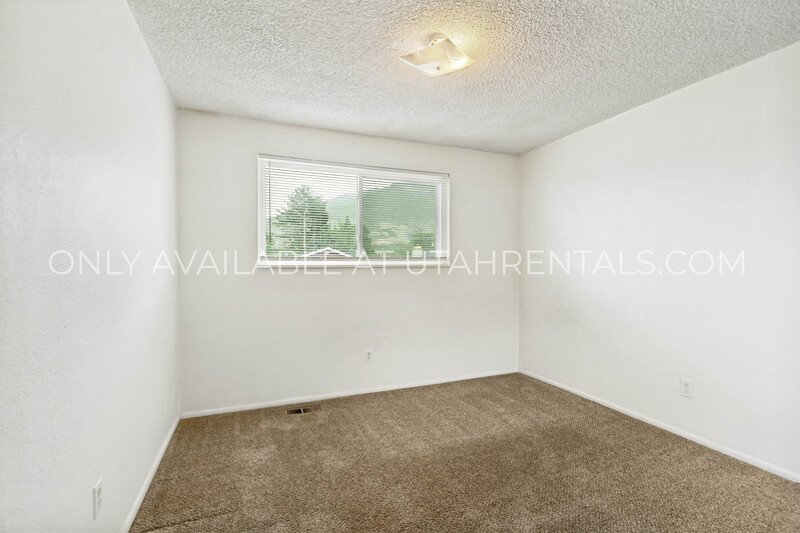 Beautiful 4-Bed, 3-Bath Orem Home with Spacious Yards & Decks property image
